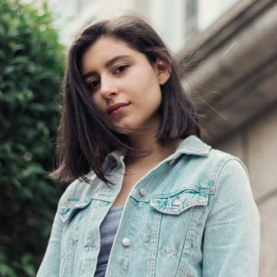 woman in blue denim button up jacket